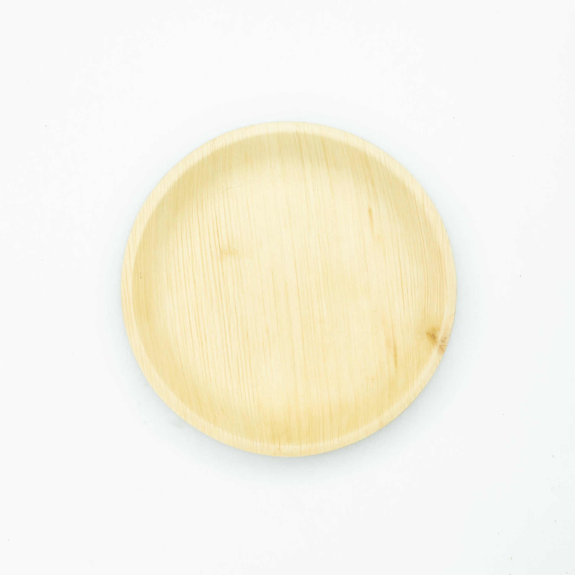 7" / 17.5cm Shallow Round Palm Leaf Disposable Plate - Eco Leaf Products